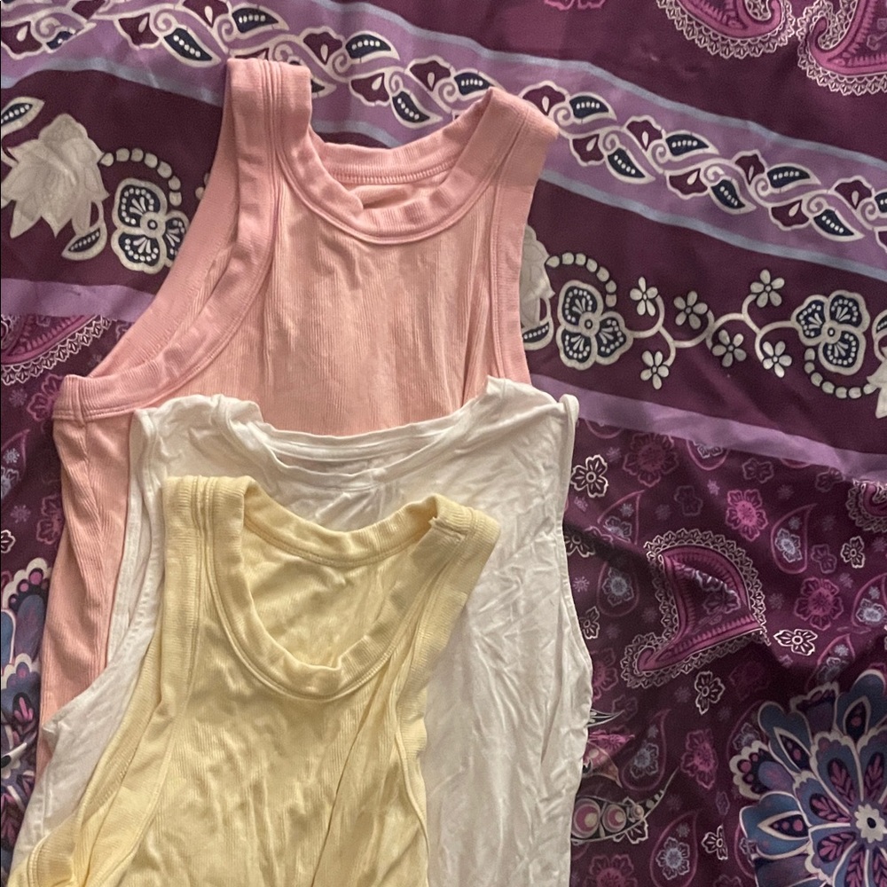 Set of Three Sleeveless Tops in Pink, White, and Yellow